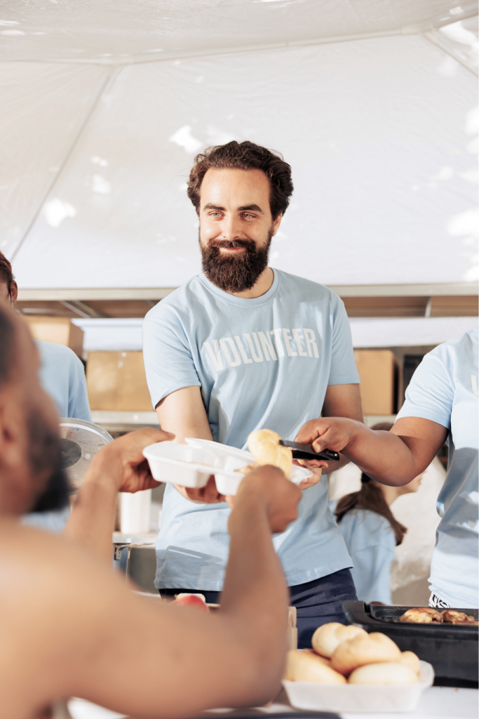 Volunteer supporting people in need